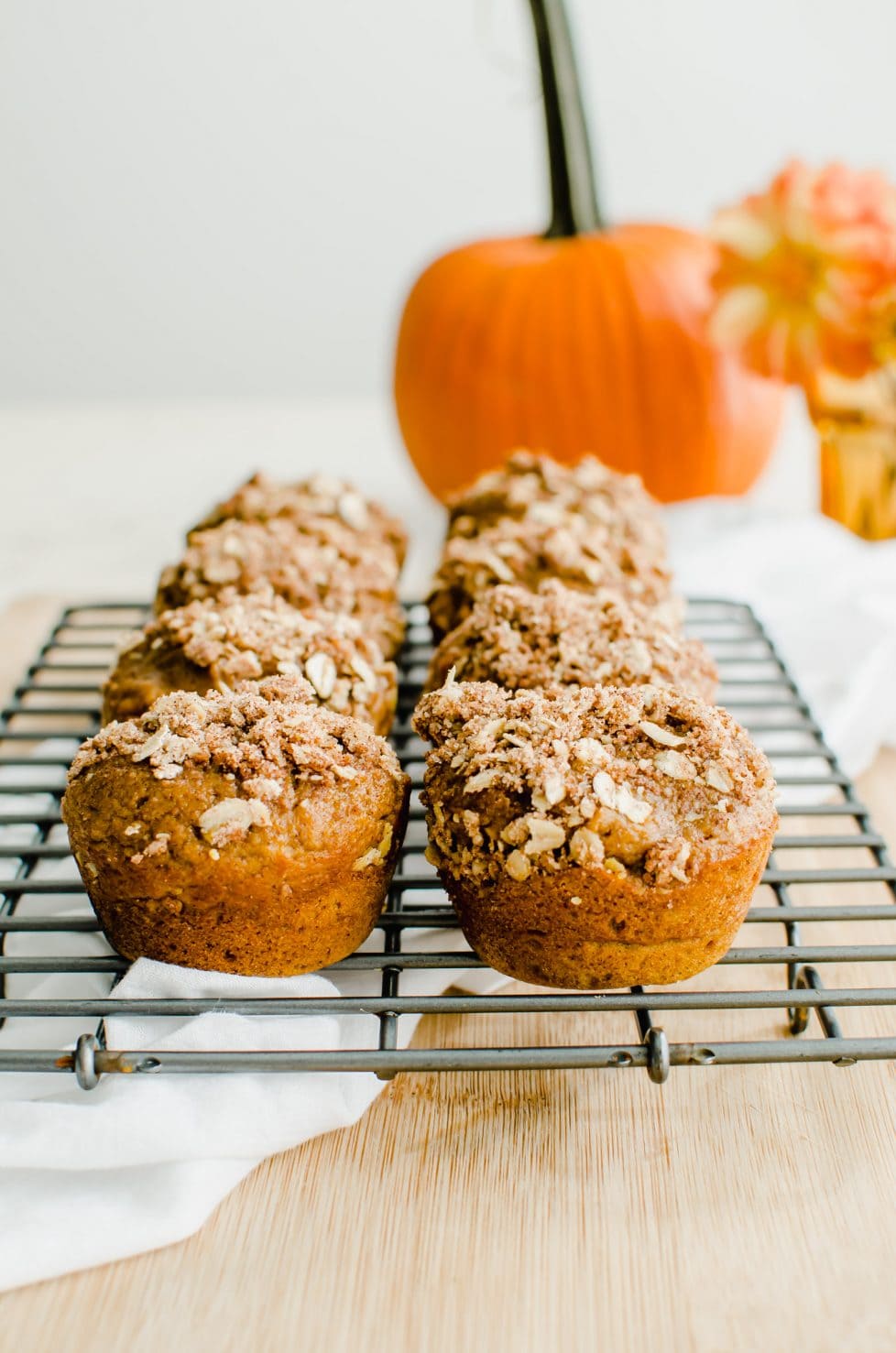 Pumpkin muffins topped with streusel.