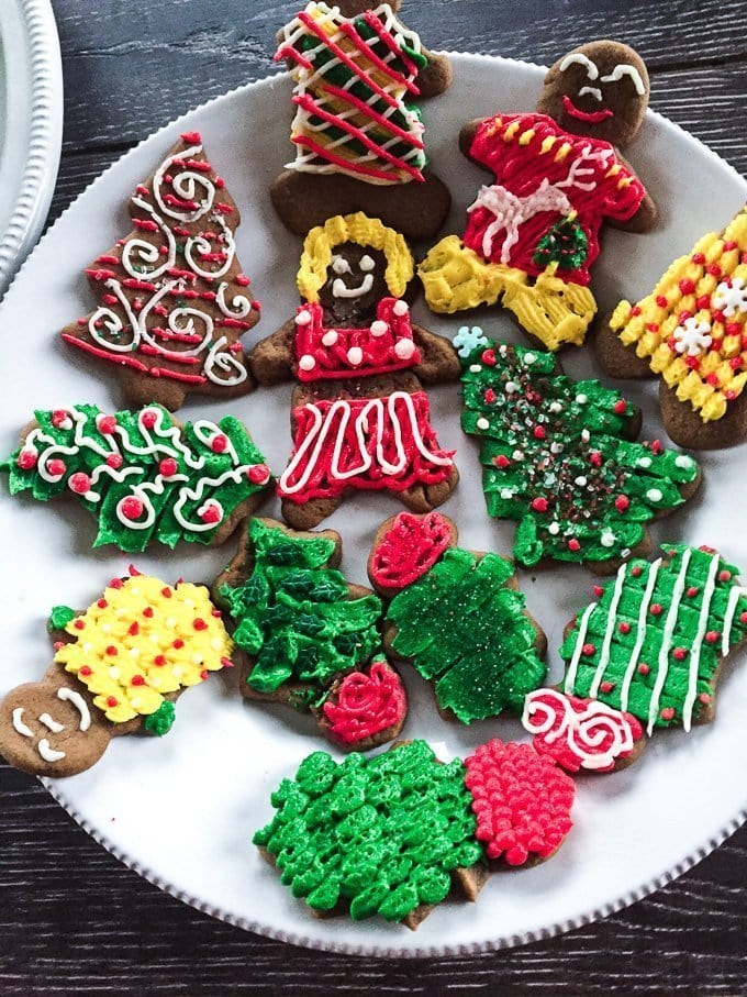 Frosted Gingerbread Cookies - soft and chewy with colorful buttercream frosting wwww.sweetcayenne.com