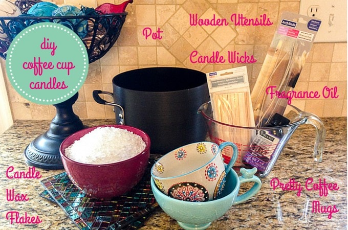 DIY Coffee Cup Candle supplies on a kitchen counter top. Pink text descriptors are over each corresponding supply item.