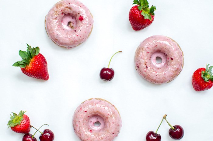 Cherry Berry Baked Donuts - easier and healthier donuts at home! These are so light and fluffy - the summer fruits add such a fresh flavor to the batter and glaze.