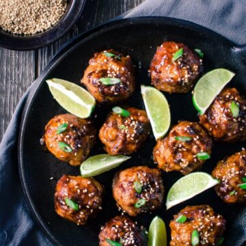 Asian BBQ Chicken Meatballs are a flavor explosion waiting to happen in your mouth! The perfect combo of sweet and savory - make these for the Super Bowl or an Oscar-watching party!