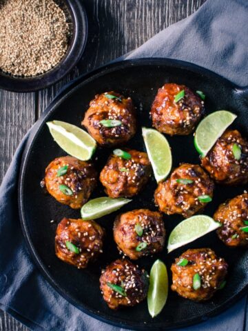 Asian BBQ Chicken Meatballs are a flavor explosion waiting to happen in your mouth! The perfect combo of sweet and savory - make these for the Super Bowl or an Oscar-watching party!