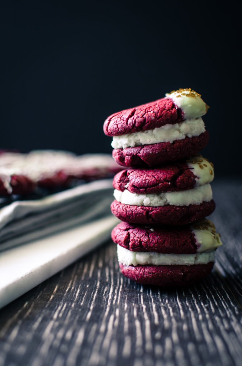 Red Velvet Sandwich Cookies are so easy to make and a great way to use a box of cake mix for a purpose other than cake! There's so many fun flavor combinations you can make with this basic recipe.