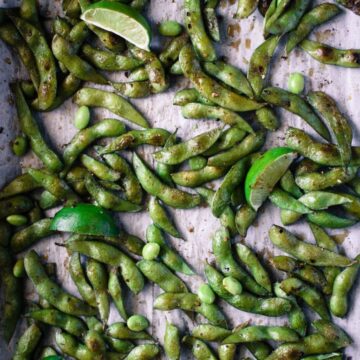 Roasted Edemame with Togarashi and Smoked Sea Salt is an easy appetizer with only 5 ingredients that comes together in under 15 minutes! It's gluten free, low calorie, and mind-blowingly delicious!