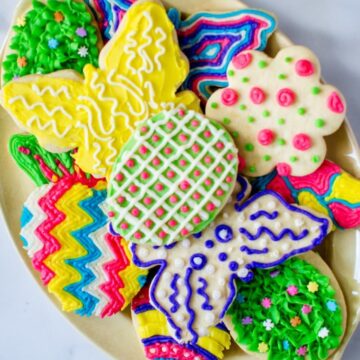 Lemon zest-laced cutout cookies iced with colorful buttercream frosting are a festive treat for Spring or Easter!