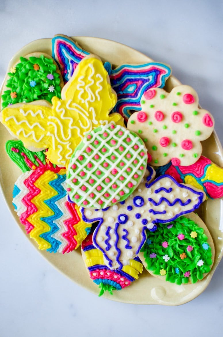 Lemon zest-laced cutout cookies iced with colorful buttercream frosting are a festive treat for Spring or Easter!