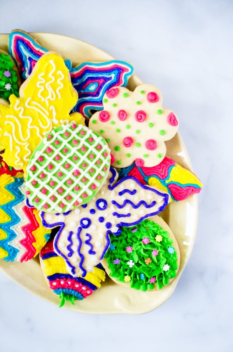 Lemon zest-laced cutout cookies iced with colorful buttercream frosting are a festive treat for Spring or Easter!