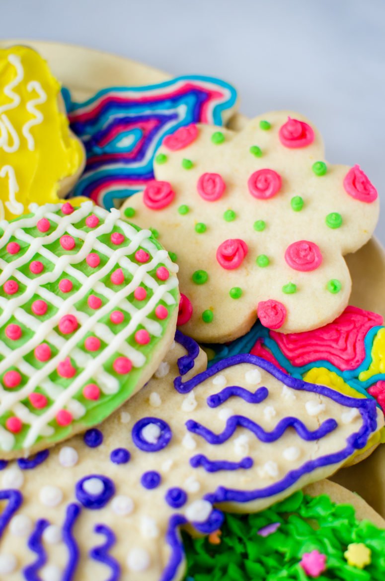 Lemon zest-laced cutout cookies iced with colorful buttercream frosting are a festive treat for Spring or Easter!