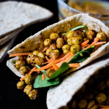 These pitas are stuffed to the brim with a powerful fusion of Middle Eastern and Asian flavors. Hot and crispy roasted chickpeas are the star and a creamy miso tahini sauce brings everything together. SO easy to make and is wonderful for lunch!