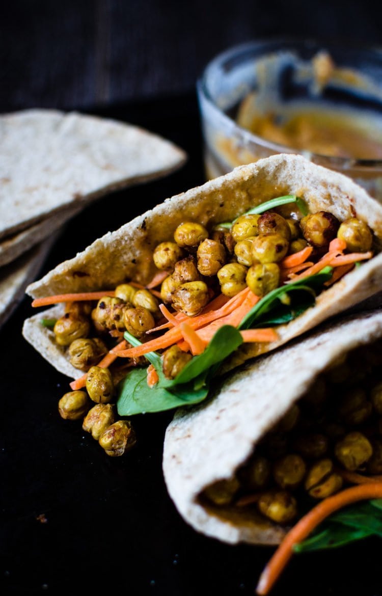 These pitas are stuffed to the brim with a powerful fusion of Middle Eastern and Asian flavors. Hot and crispy roasted chickpeas are the star and a creamy miso tahini sauce brings everything together. SO easy to make and is wonderful for lunch!