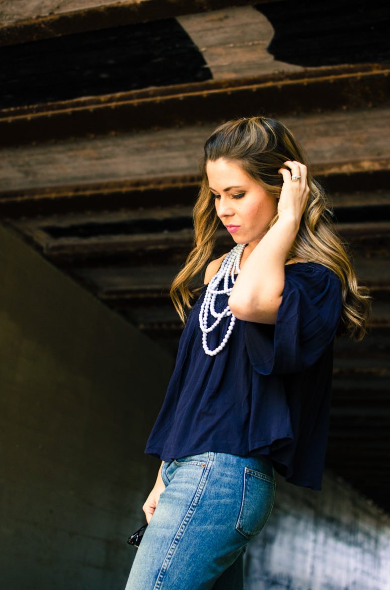 This spring and summer outfit is casual and cute for a day of running around town - off the shoulder top with crochet detail and layered marble-print beads. Style, fashion, and outfit inspiration.