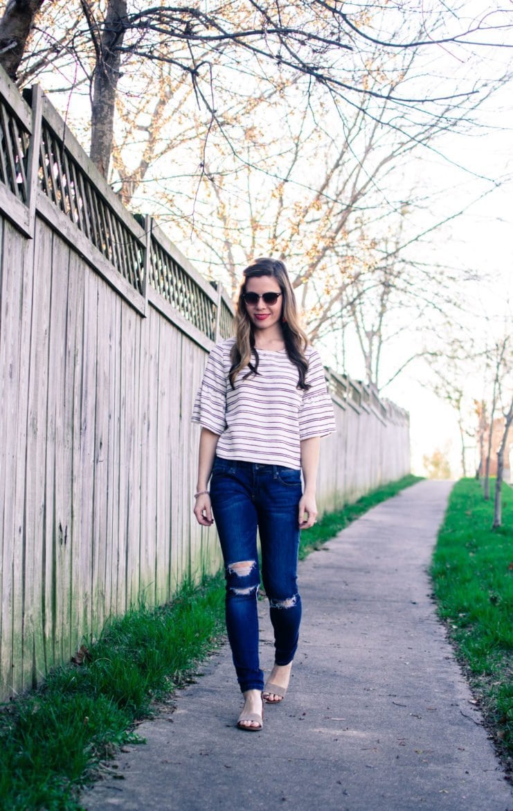 Cropped striped blouse from Who What Wear collection at Target with distressed denim and tassel jewelry. 