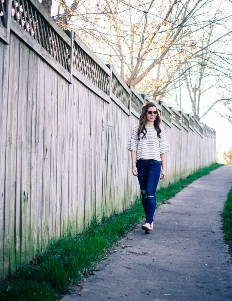 Cropped striped blouse from Who What Wear collection at Target with distressed denim and tassel jewelry. 