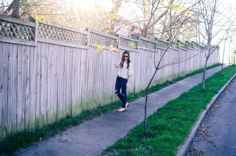 Cropped striped blouse from Who What Wear collection at Target with distressed denim and tassel jewelry. 