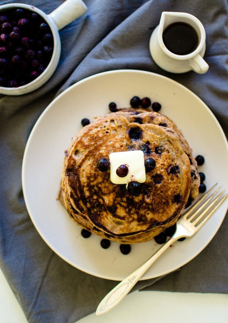 A plate of blueberry pancakes.