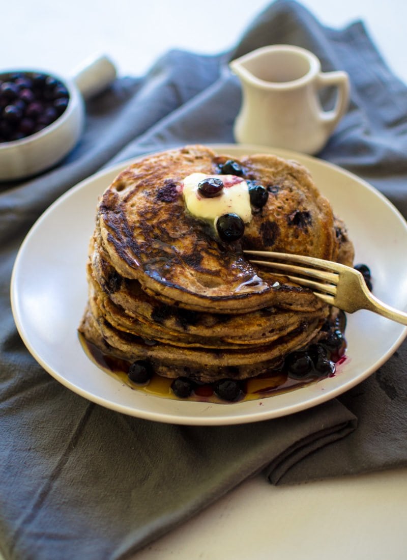 This Wild Blueberry Buttermilk Pancake recipe is the ultimate weekend comfort food! They are light, fluffy, and cooked to golden brown perfection. Make a big batch and freeze some for breakfast during the week!