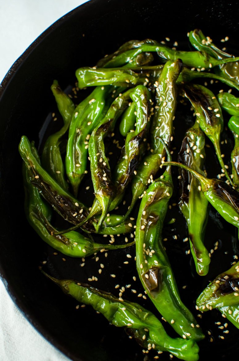 This recipe for Blistered Sesame Shishito Peppers is an easy snack or side dish that you can make in a snap! It's vegan, gluten free, and packed with flavor!