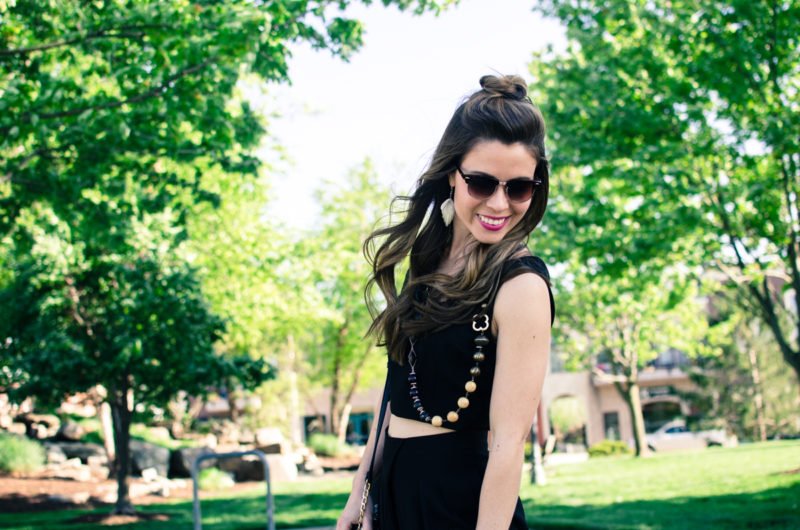 This sleek two piece black jump suit is so versatile and can be styled to look great for a day of errands or a night on the town! DIY fashion and style inspiration for women. 