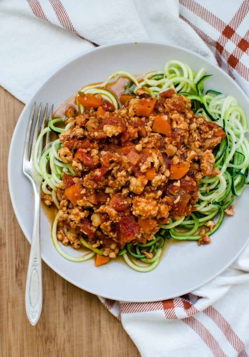 Zucchini Noodles with Chicken Bolognese is an easy, veggie-loaded recipe you can make on weeknights for a healthy and super-satisfying dinner that the family will love!