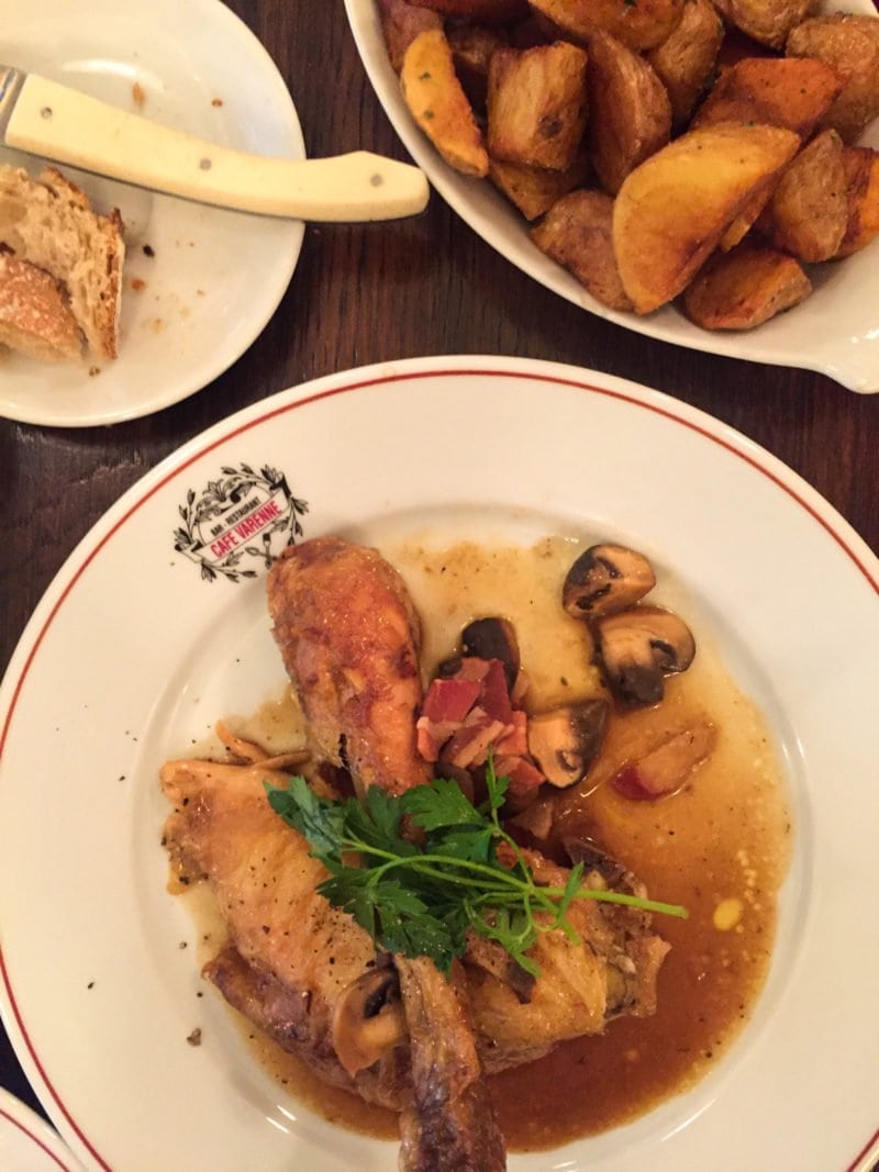 Roast chicken with crispy potatoes from Cafe Varenne in Paris France