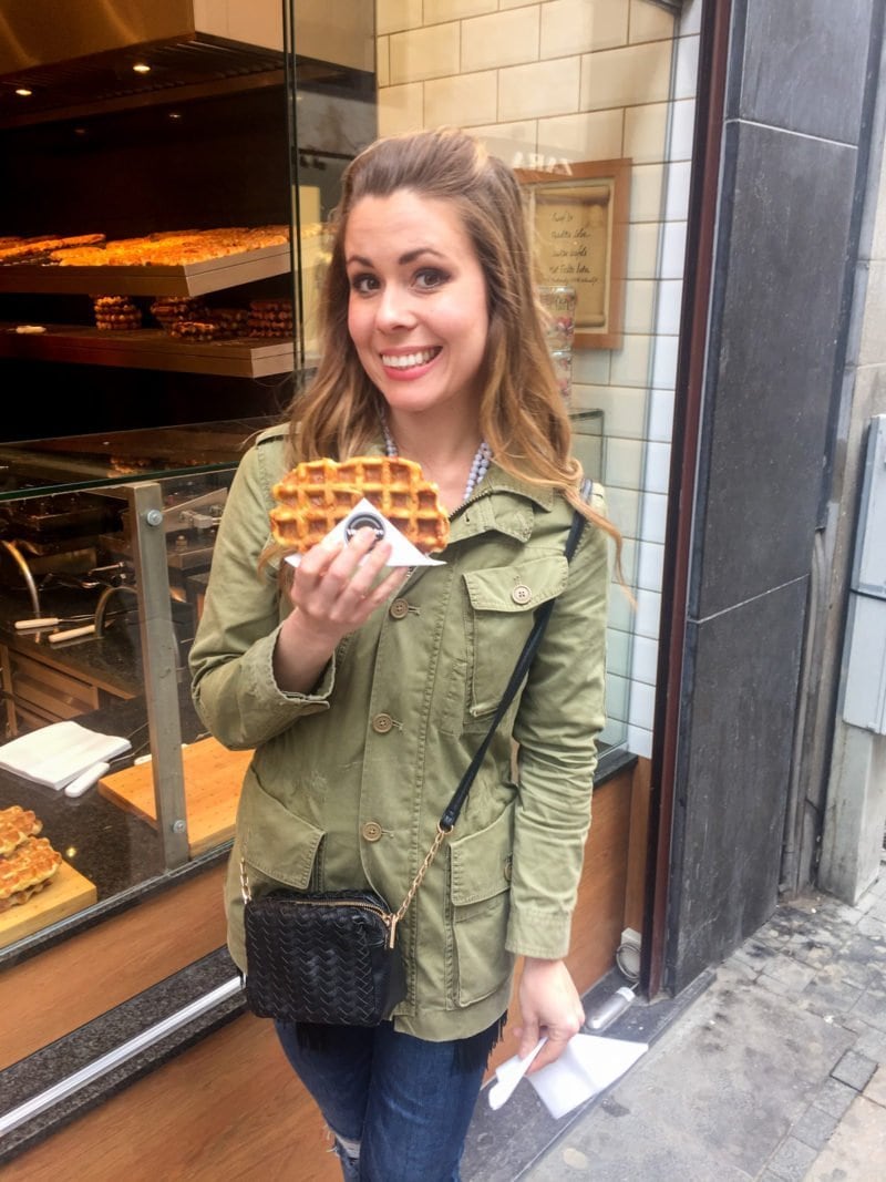 Enjoying a hot Belgian waffle in downtown Brussels, Belgium