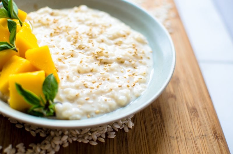 This recipe for creamy coconut rice pudding is made with coconut milk, arborio rice, and subtly steeped with Thai basil. It's such a refreshing summer dessert!