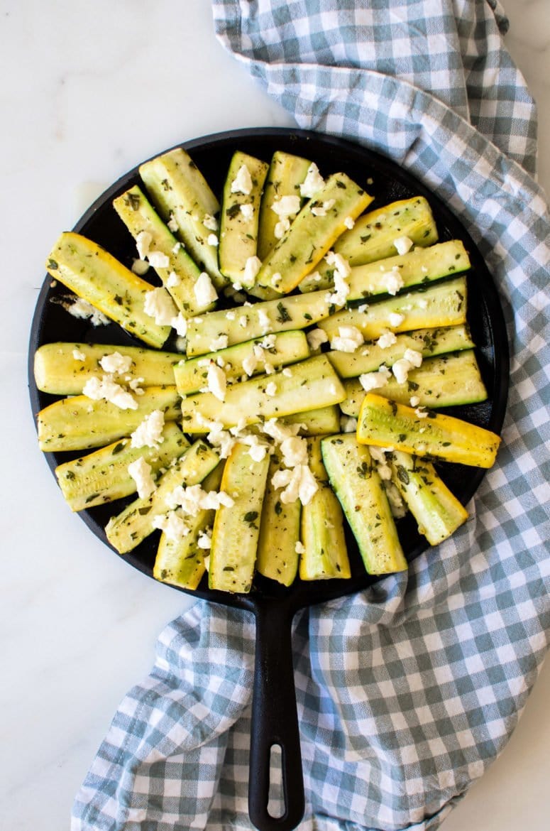 This recipe for Greek-Style Roasted Zucchini with Feta is a simple side dish that highlights summer produce and fresh herbs!