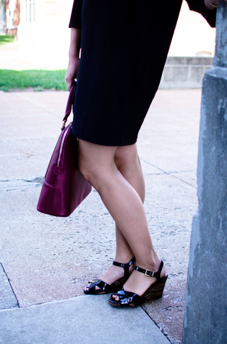 This edition of Sweet Chic features a dolman sleeve little black dress that's perfect for fall. It's paired with a wine-colored satchel bag and animal print wedges for a chic street-style outfit. 