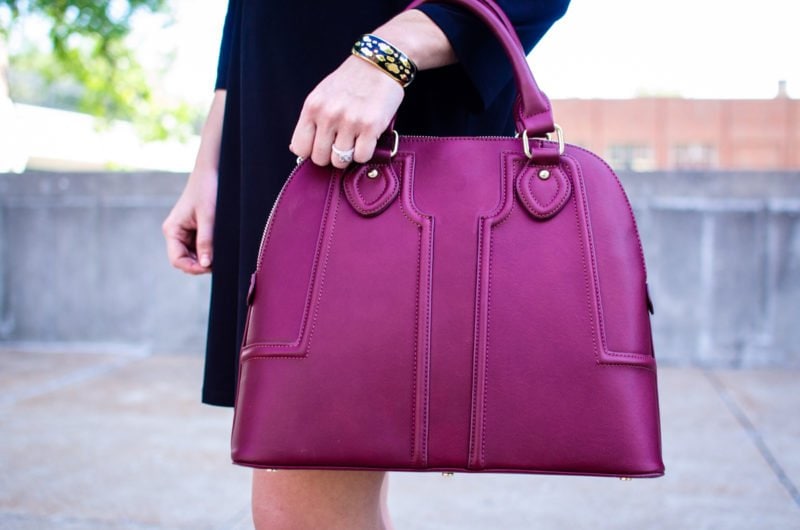 This edition of Sweet Chic features a dolman sleeve little black dress that's perfect for fall. It's paired with a wine-colored satchel bag and animal print wedges for a chic street-style outfit. 