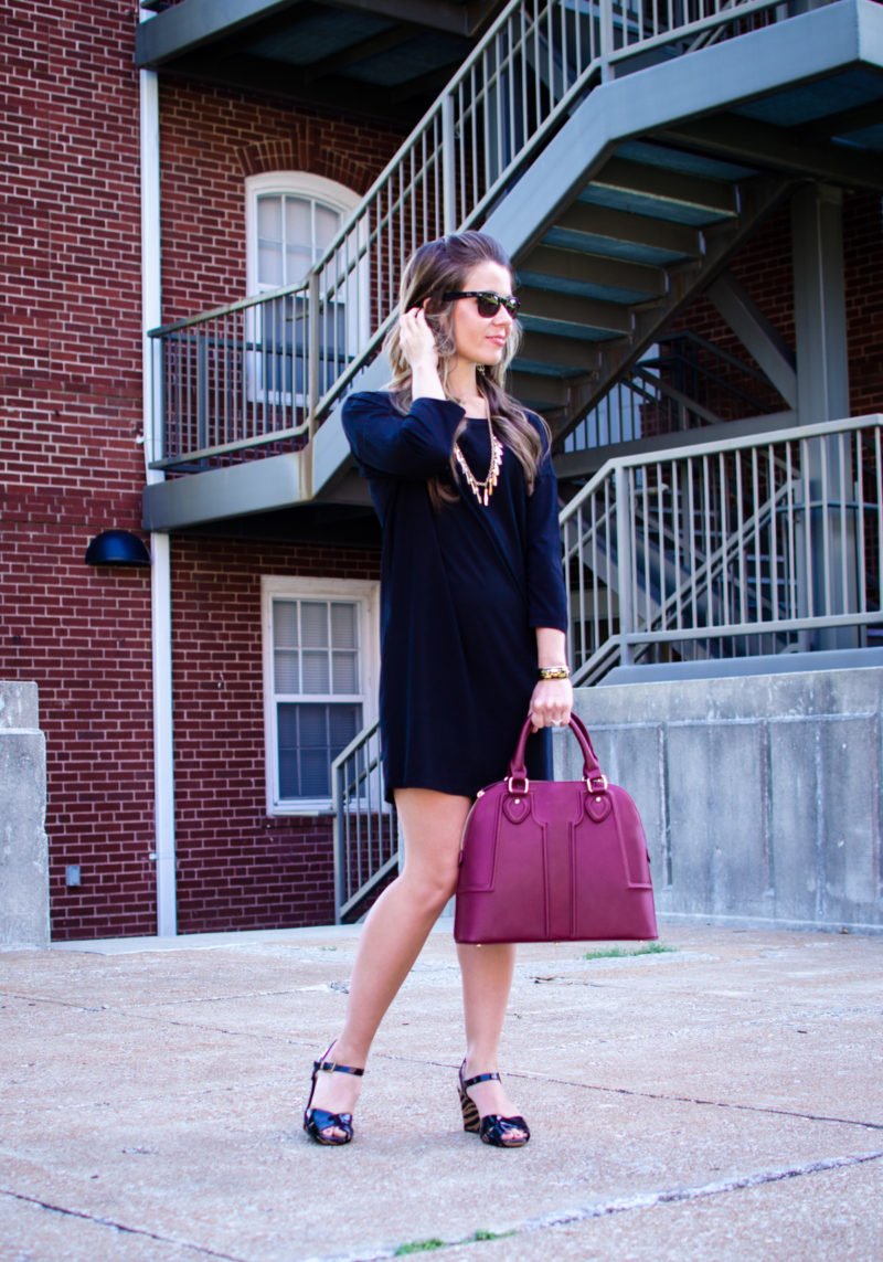 This edition of Sweet Chic features a dolman sleeve little black dress that's perfect for fall. It's paired with a wine-colored satchel bag and animal print wedges for a chic street-style outfit. 