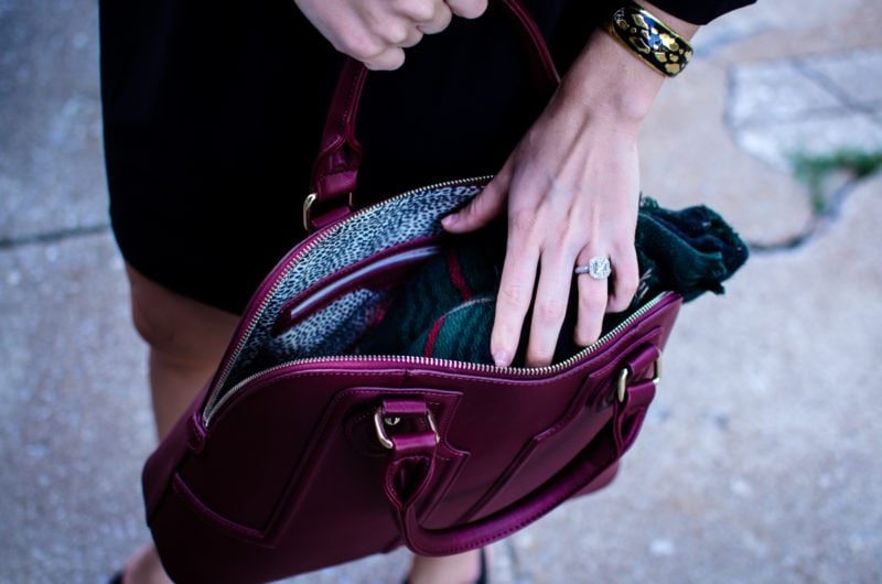 This edition of Sweet Chic features a dolman sleeve little black dress that's perfect for fall. It's paired with a wine-colored satchel bag and animal print wedges for a chic street-style outfit. 