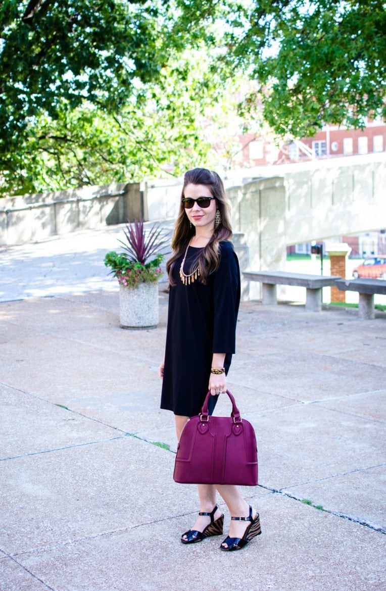 This edition of Sweet Chic features a dolman sleeve little black dress that's perfect for fall. It's paired with a wine-colored satchel bag and animal print wedges for a chic street-style outfit. 