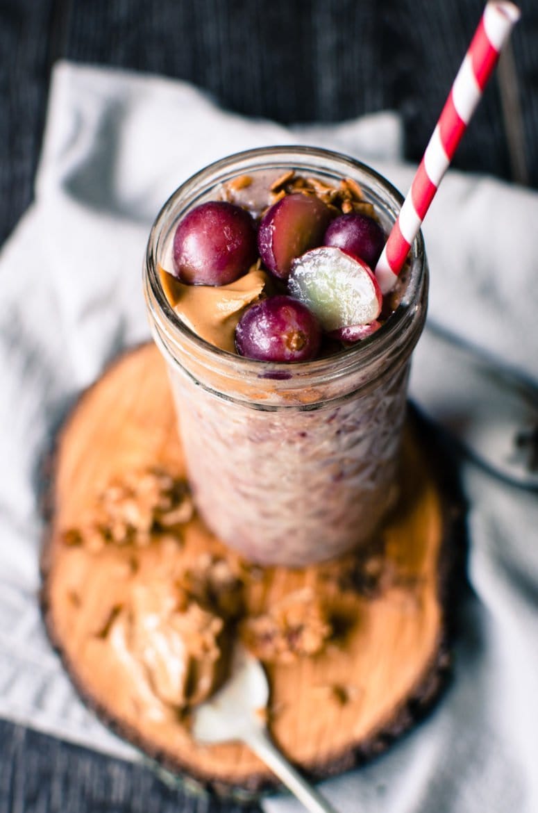 This recipe for overnight oats peanut butter and grape smoothie is prepped the night before so that you can easily prep a hearty smoothie in the morning that tastes like a PB&J!