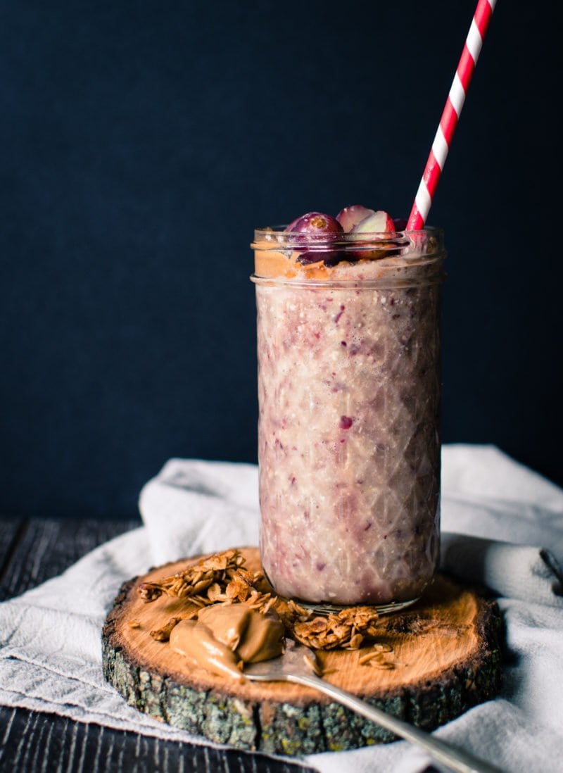 This recipe for overnight oats peanut butter and grape smoothie is prepped the night before so that you can easily prep a hearty smoothie in the morning that tastes like a PB&J!