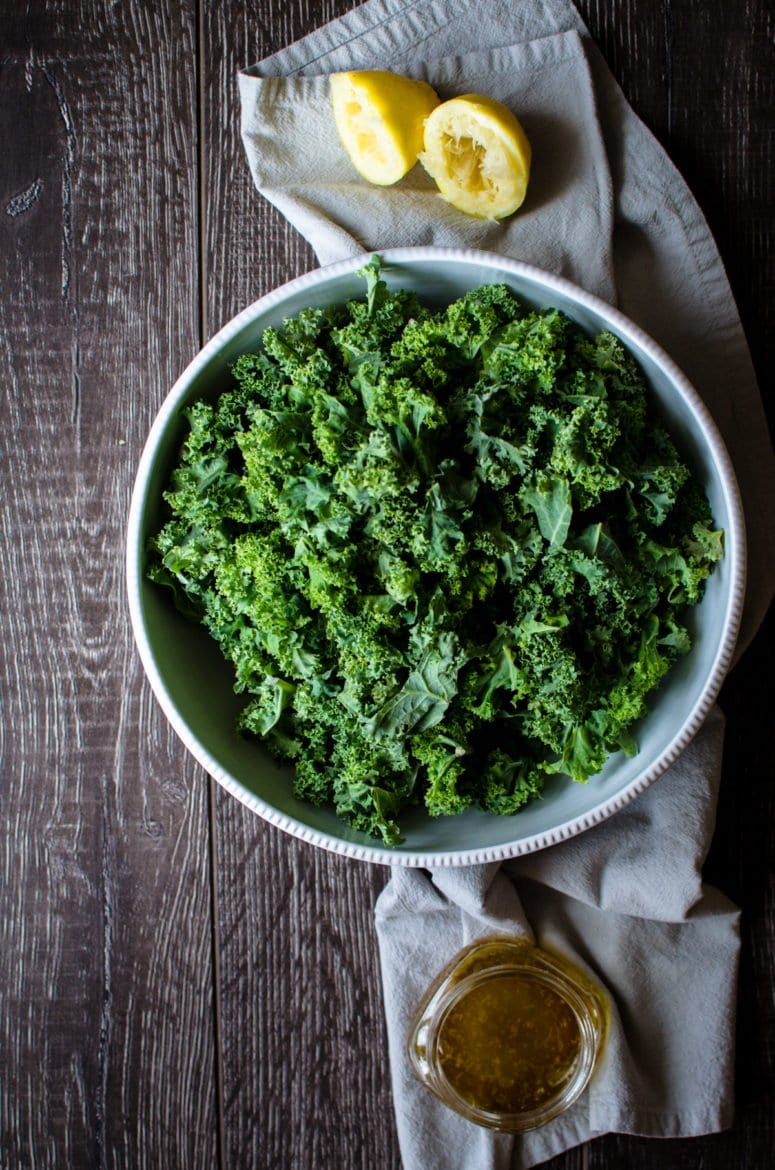 This simple kale salad is the perfect vehicle for creative toppings, homemade croutons, and can be used as a side dish or as sandwich filling!