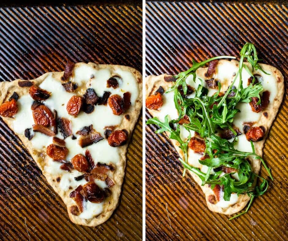 Two slices of pizza. One with arugula on top.