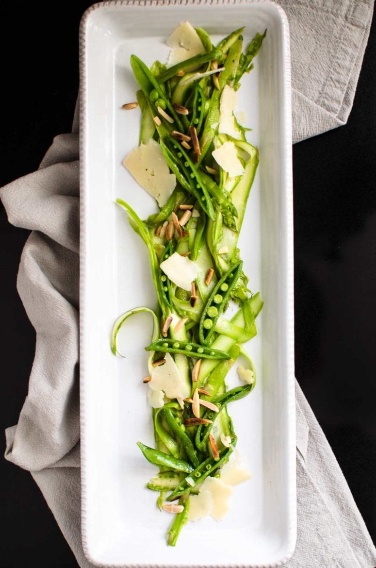 Shaved asparagus salad on a serving dish. 