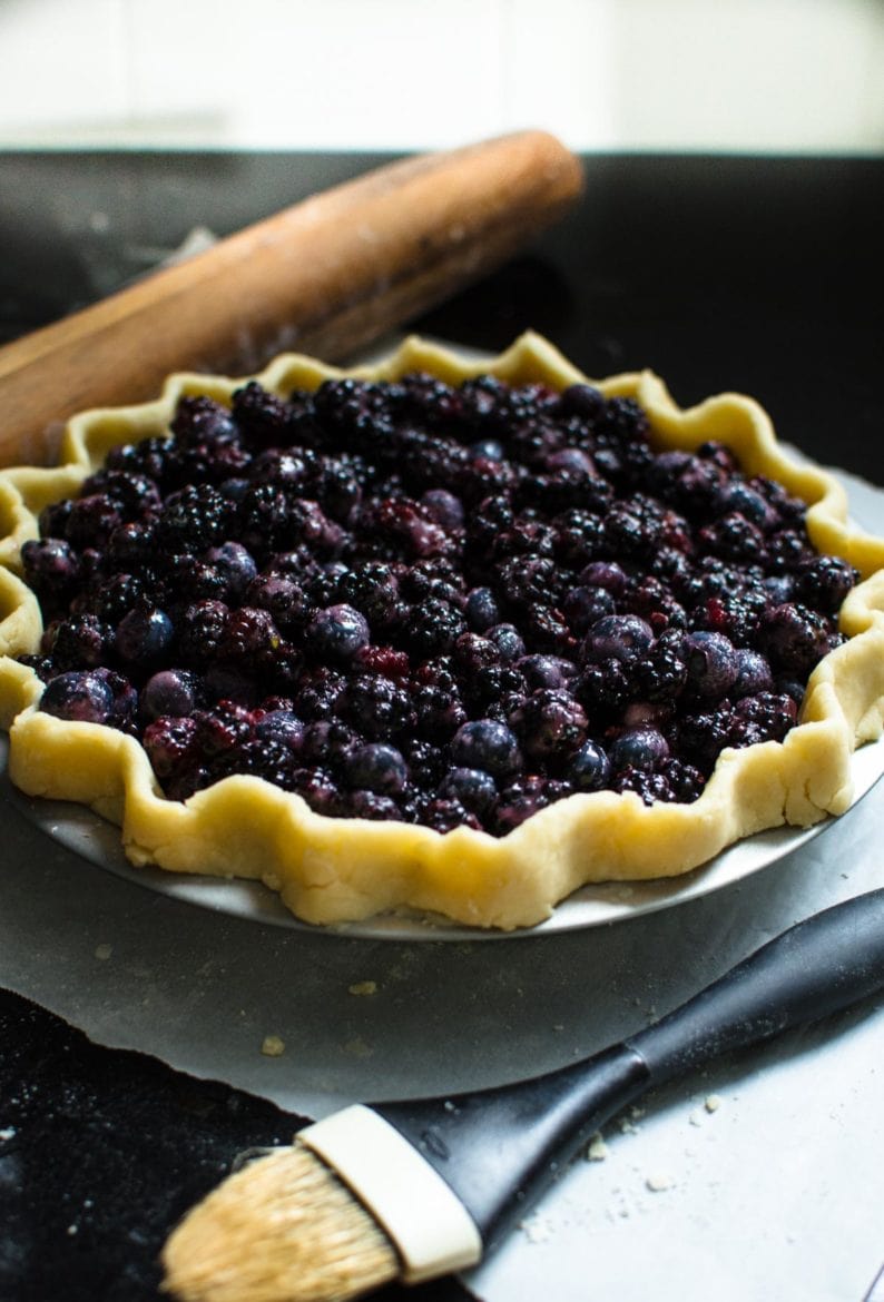 Mixed berry pie in pie dish prior to being put in the oven. 