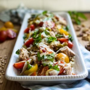 This recipe for Tuna Superfood Power Salad is packed with wholesome and delicious ingredients - tuna, walnuts, farro, tomatoes, and more! It's easy to make with pantry staples and is great for leftovers!