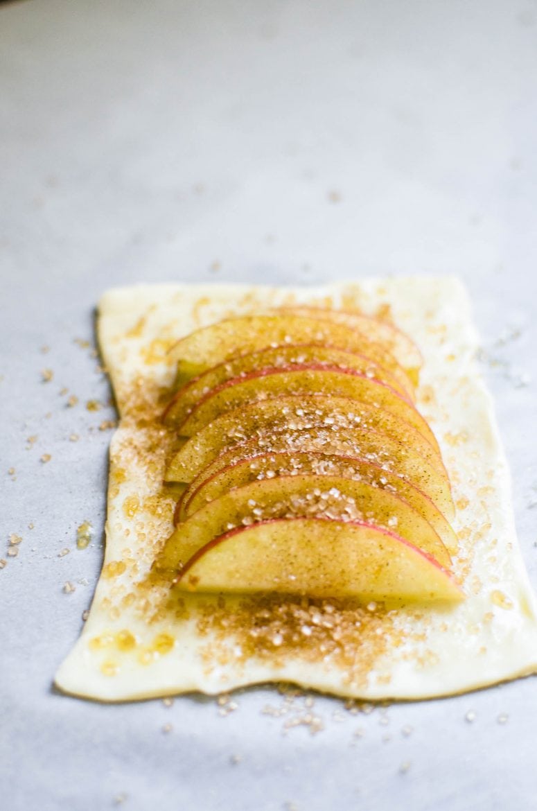 Pastry with sliced apples and cinnamon sugar. 