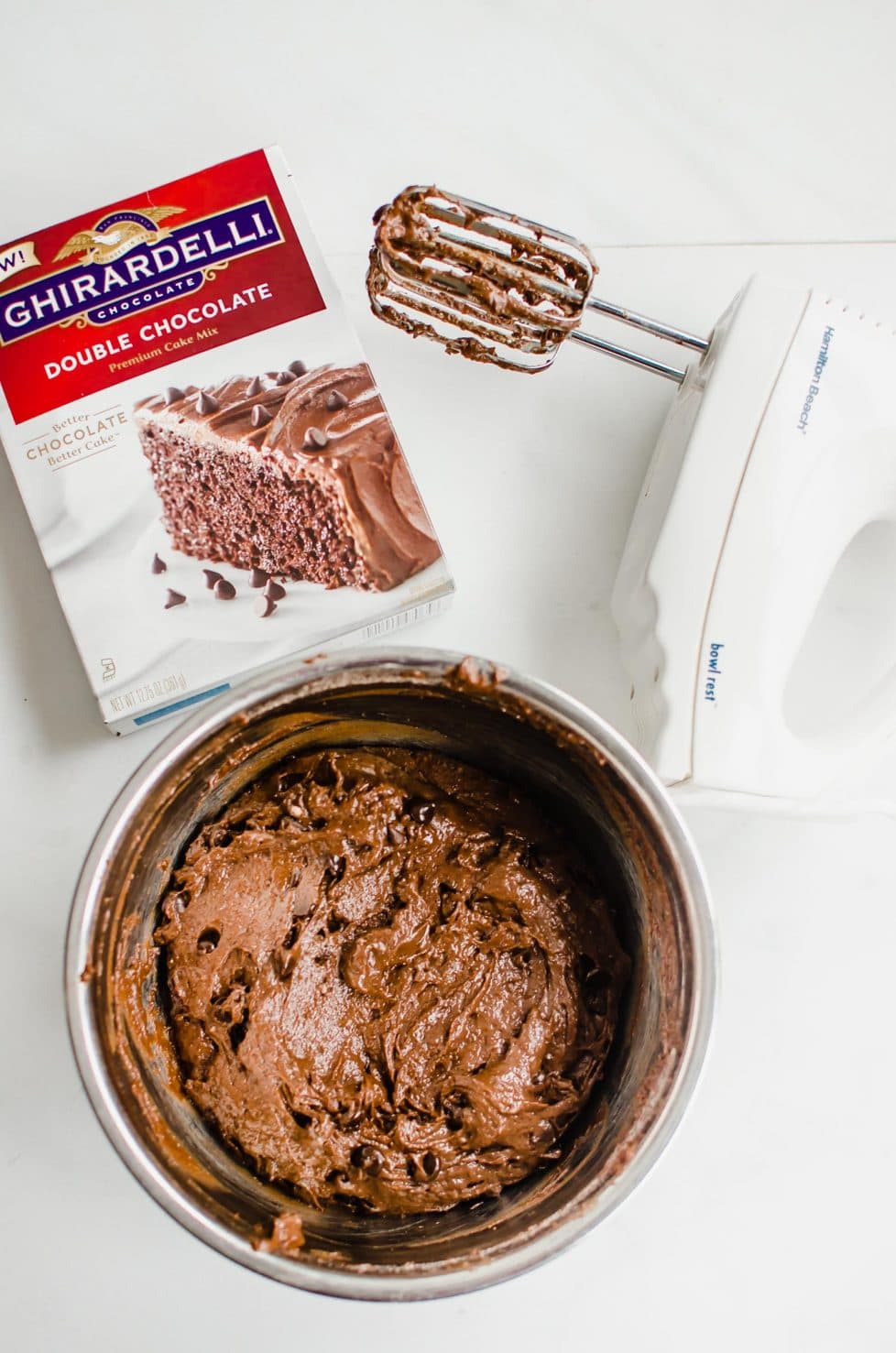 This recipe for Back Pocket Chocolate Fudge Cake is an easy bundt cake that is super moist, fudgy, and extra delicious. It's made with Ghirardelli chocolate, sour cream, and topped with hot fudge and caramel! #valentines #chocolatecake