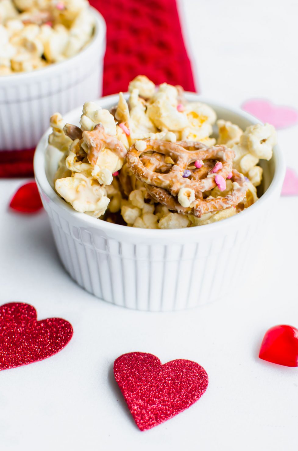 A serving bowl of cupid crack snack mix. 