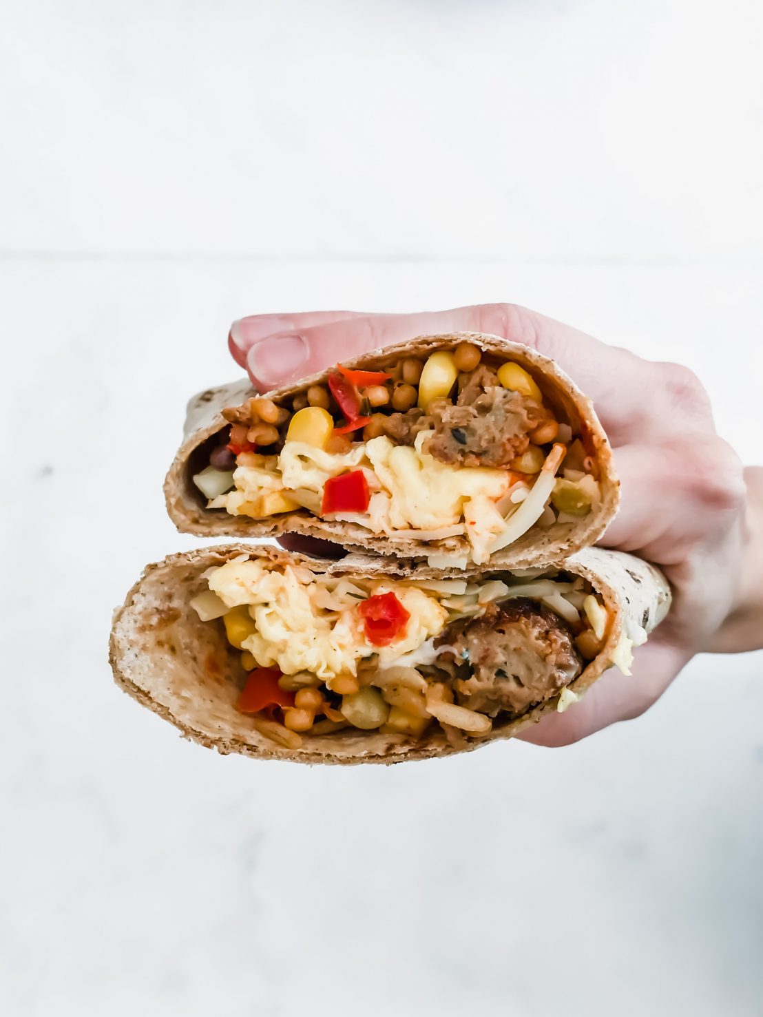 This recipe for Meal Prep Breakfast Burritos is a great make-ahead option for breakfast. They are packed with plant-based protein and full of Southwest flavor!