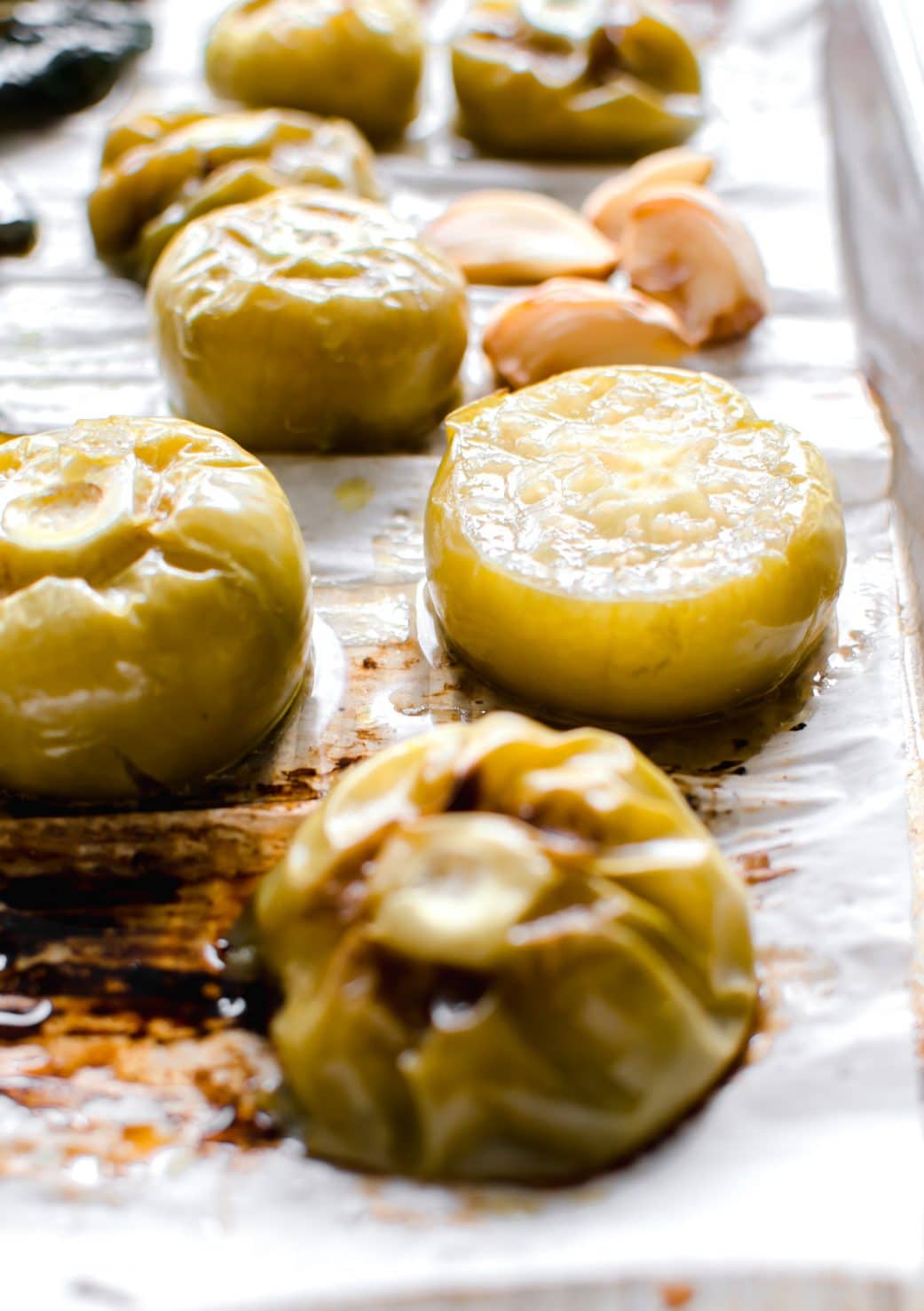 A close up of roasted tomatillos.