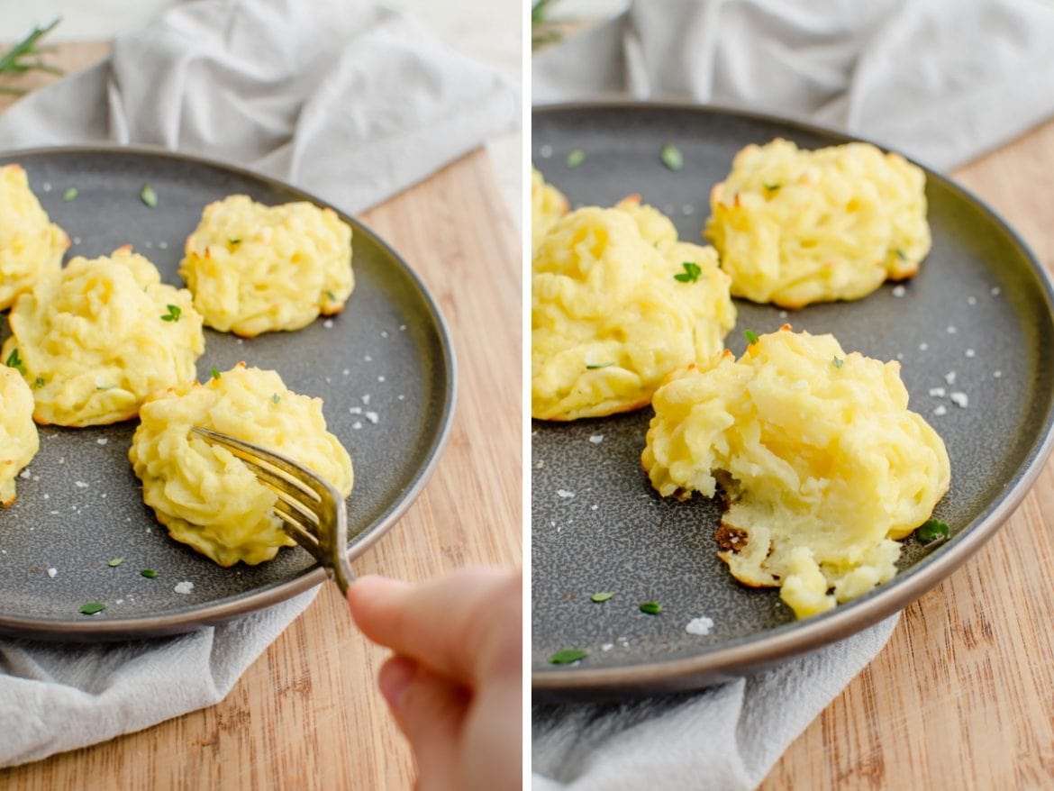 A plate with duchess potatoes and a bite taken out of one.