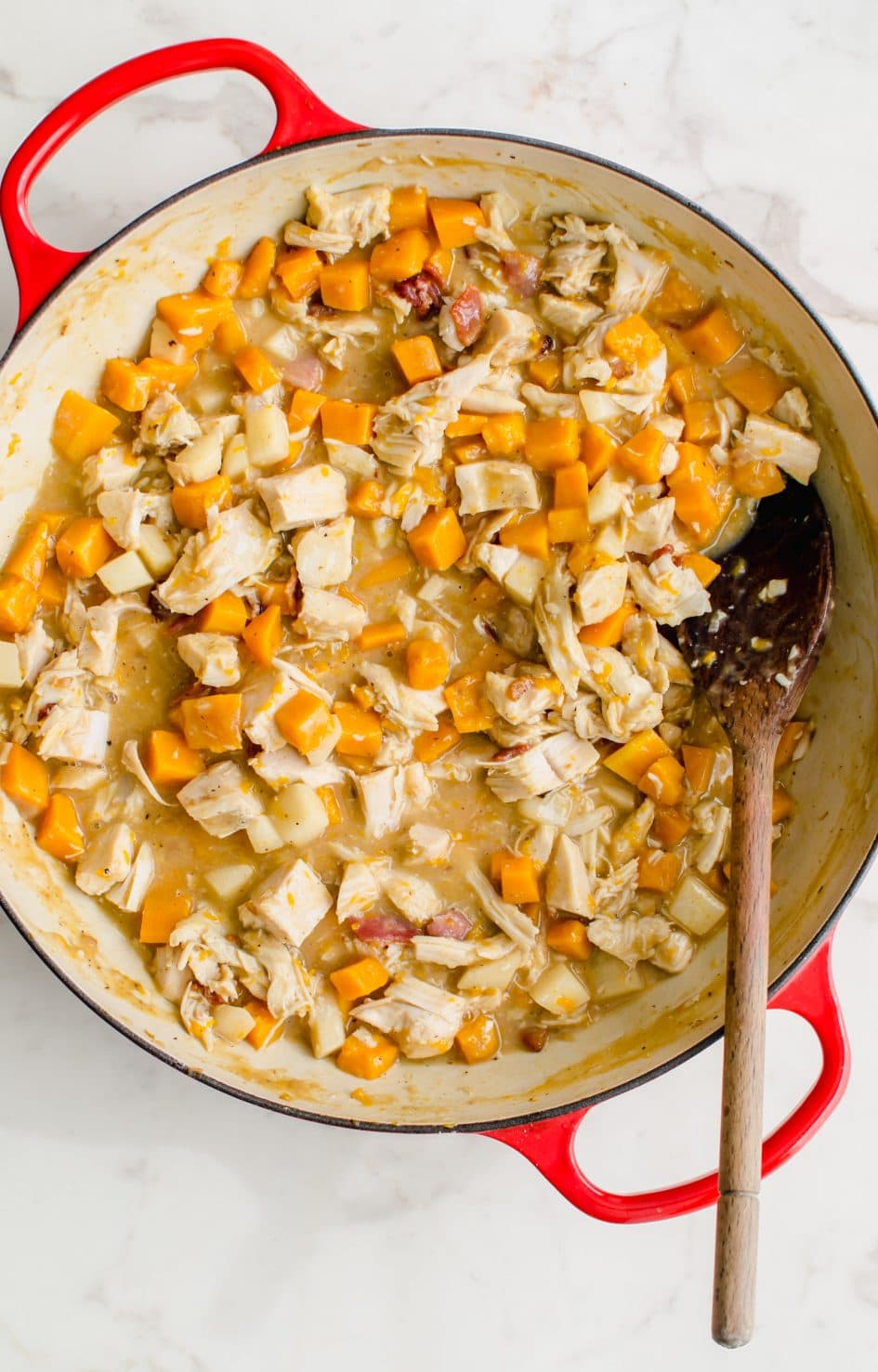 A pot with turkey pot pie filling.