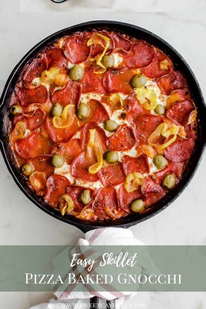 A cast iron skillet filled with pizza baked gnocchi.