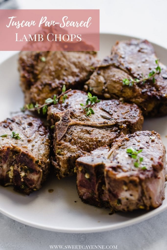 A side shot of Tuscan grilled lamb chops on a white plate with a fork on the side.