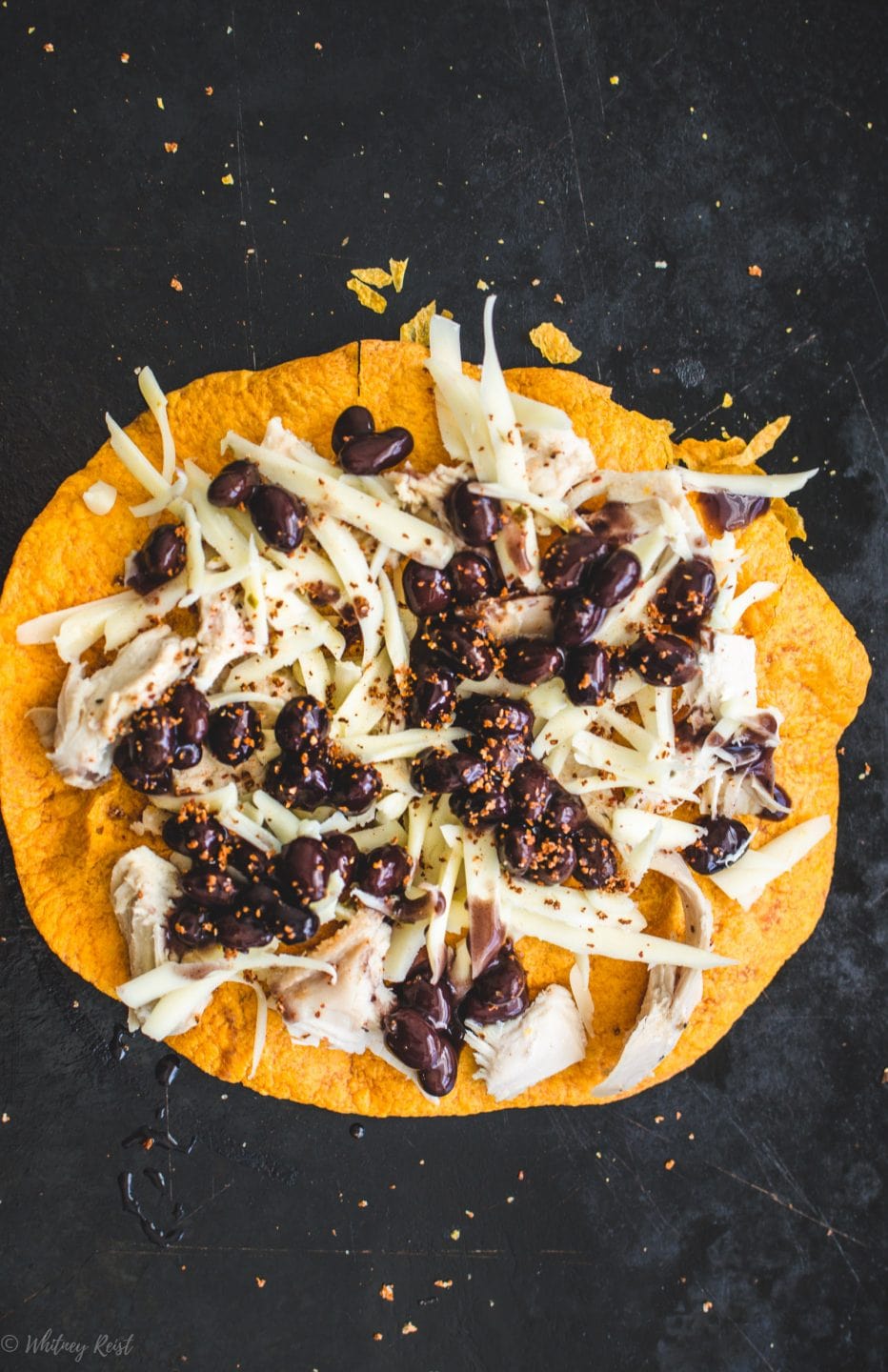 A tostada prior to cooking in the oven. 