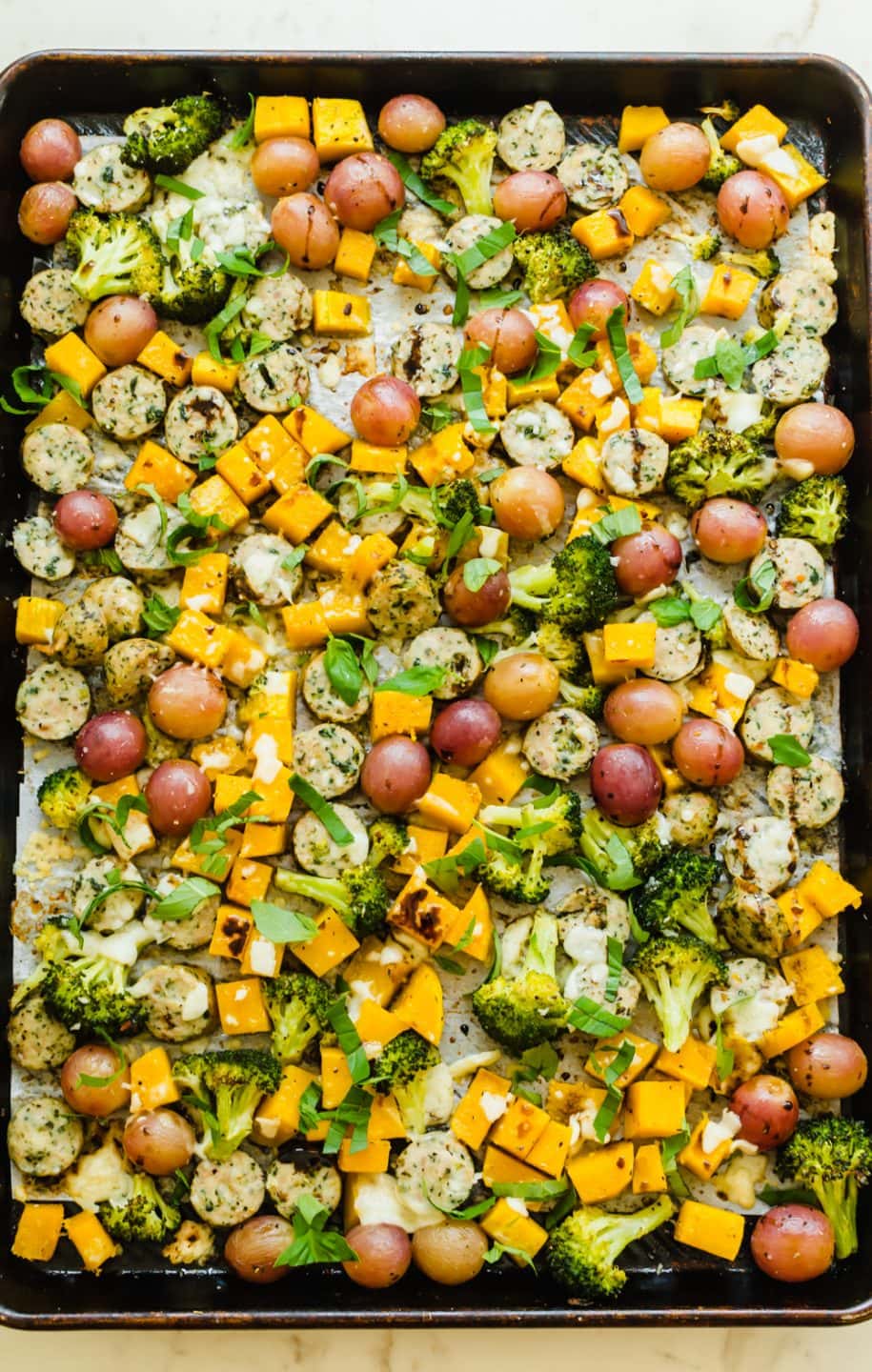 A sheet pan full of roasted vegetables.